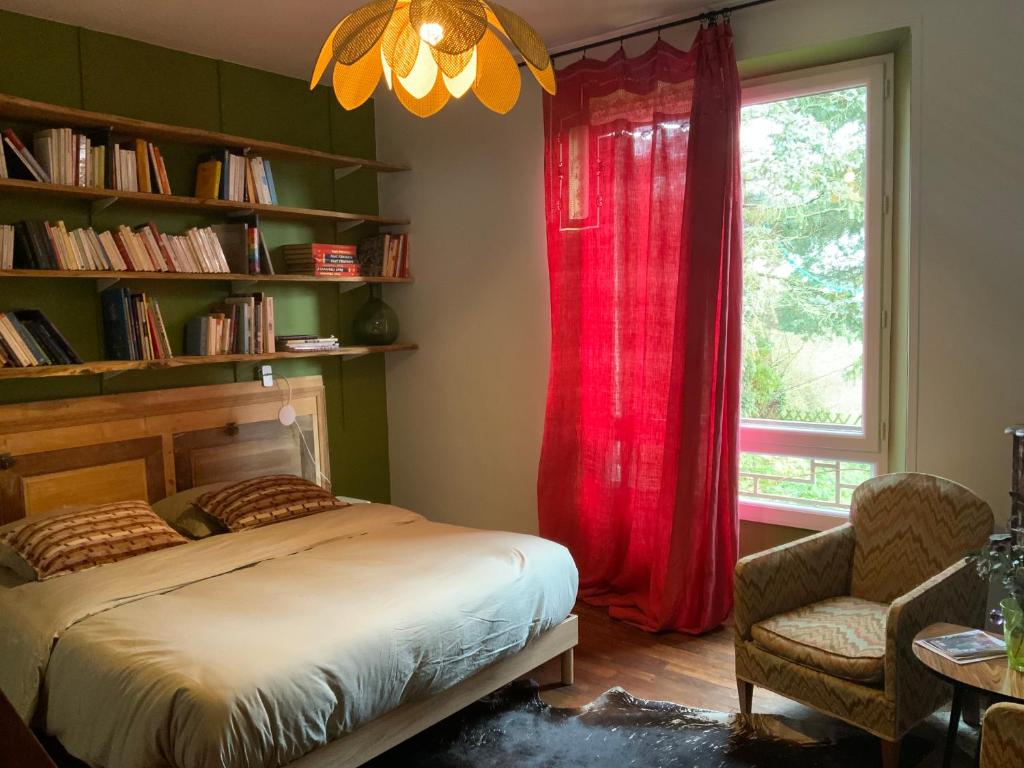 En eller flere senge i et værelse på La chambre aux livres