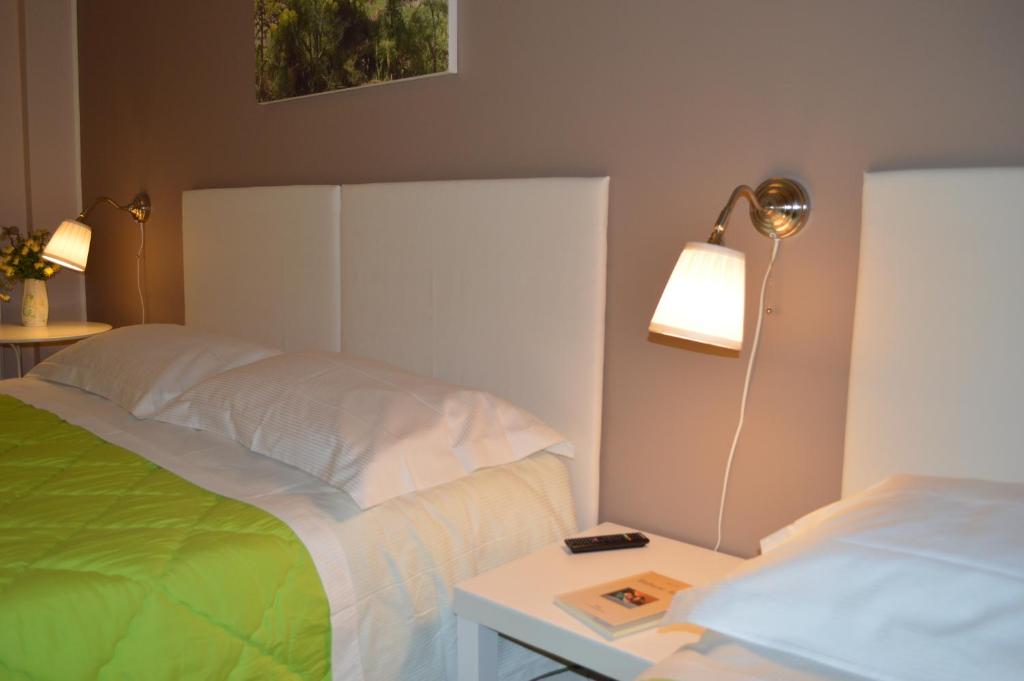 Posteľ alebo postele v izbe v ubytovaní Porta Matera B&b