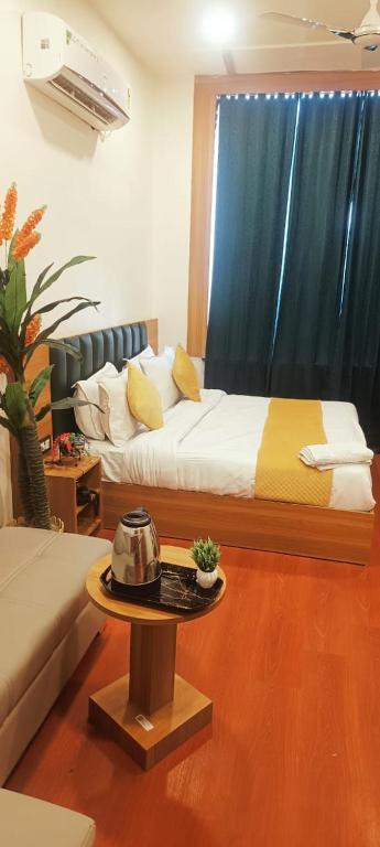 Postel nebo postele na pokoji v ubytování Hotel golden tree