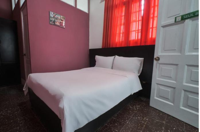 Postel nebo postele na pokoji v ubytování La Casa de Algodon