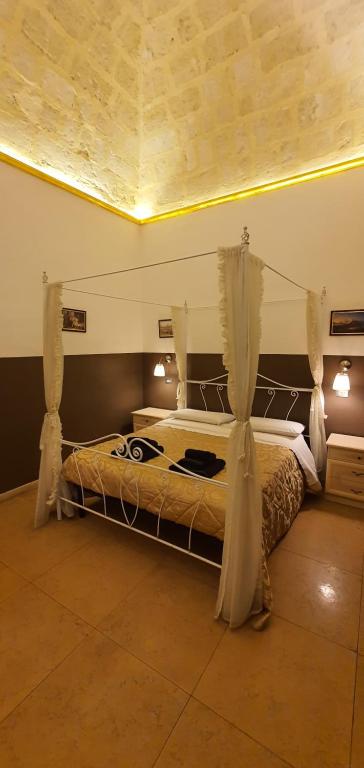 Postel nebo postele na pokoji v ubytování Sparta