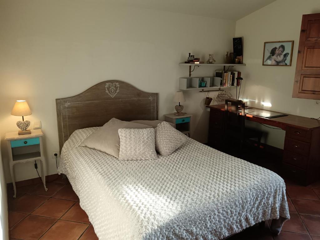 Postel nebo postele na pokoji v ubytování Villa Claudine