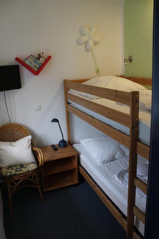 Postel nebo postele na pokoji v ubytování Ferienwohnung Sonnenschein mit großem Balkon
