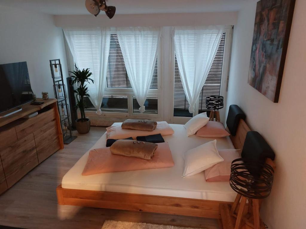Postel nebo postele na pokoji v ubytování El Destino Apartments