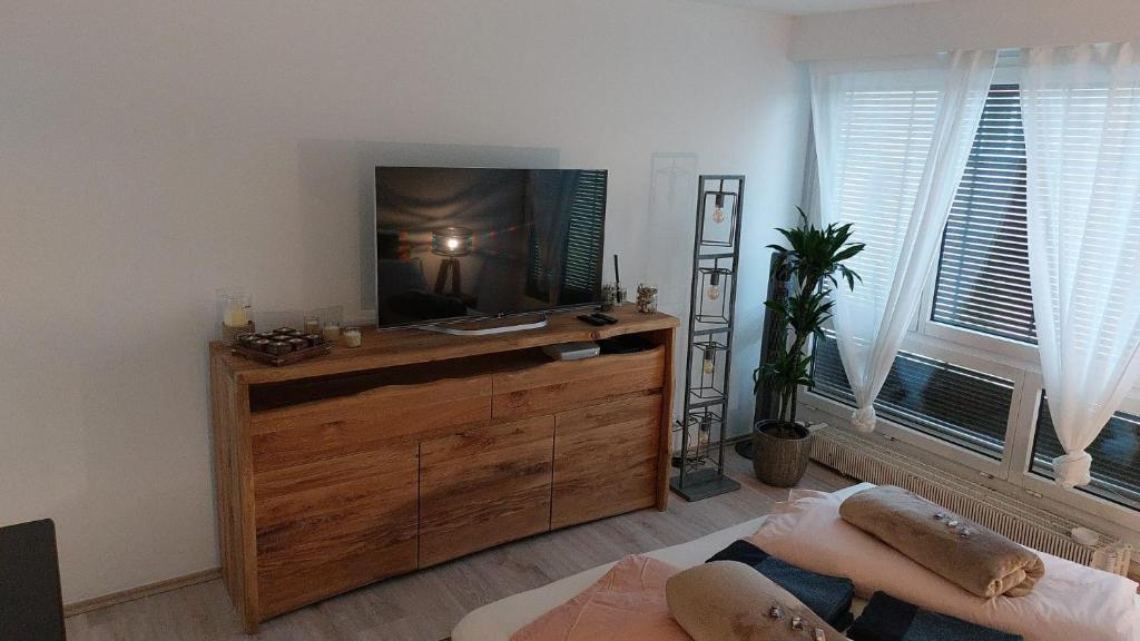 TV a/nebo společenská místnost v ubytování El Destino Apartments