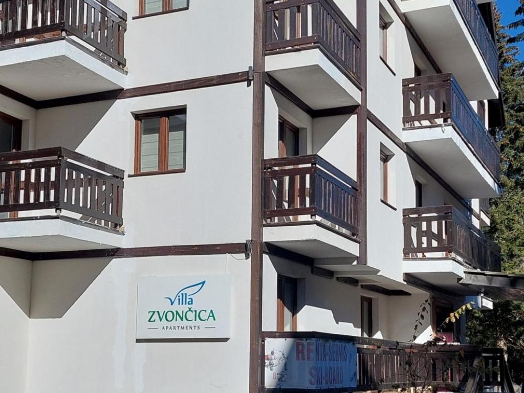 a building with balconies on the side of it at Vila Zvončica, apartman Puzović 22 in Kopaonik