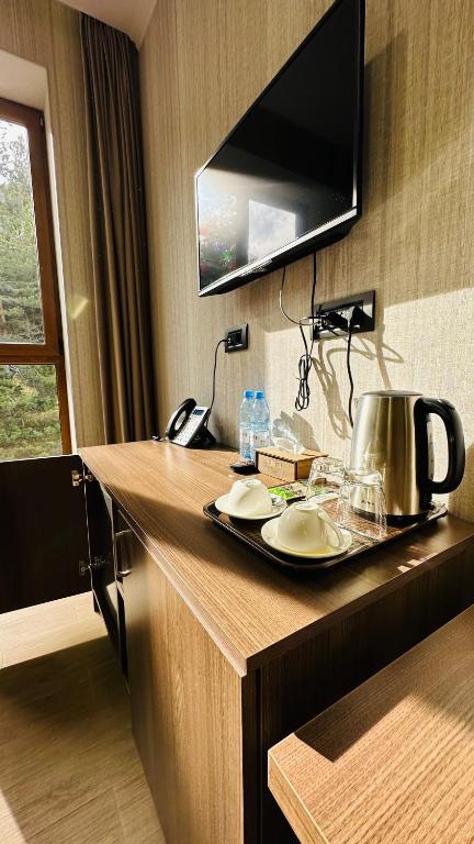 TV a/nebo společenská místnost v ubytování Marrone Hotel Tsaghkadzor