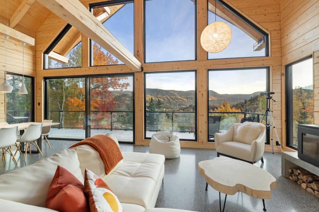Posezení v ubytování Le Harfång - Vue imprenable - Sauna - 3min du Mont