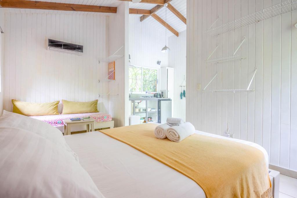 Postel nebo postele na pokoji v ubytování Boho lodge Montezuma l&l