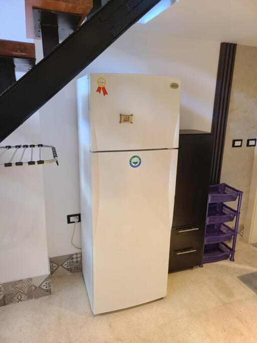 Kuchyň nebo kuchyňský kout v ubytování Loft Apartment Jabal Amman B