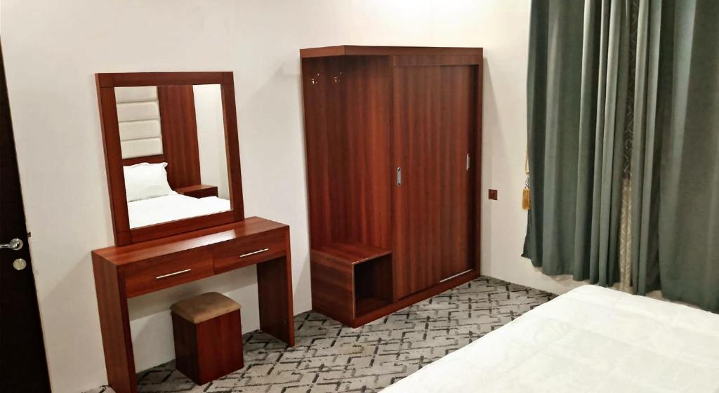 Postel nebo postele na pokoji v ubytování سماء الضيافة للوحدات السكنية المفروشة