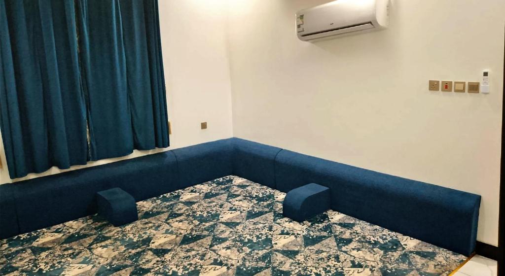 Postel nebo postele na pokoji v ubytování سماء الضيافة للوحدات السكنية المفروشة