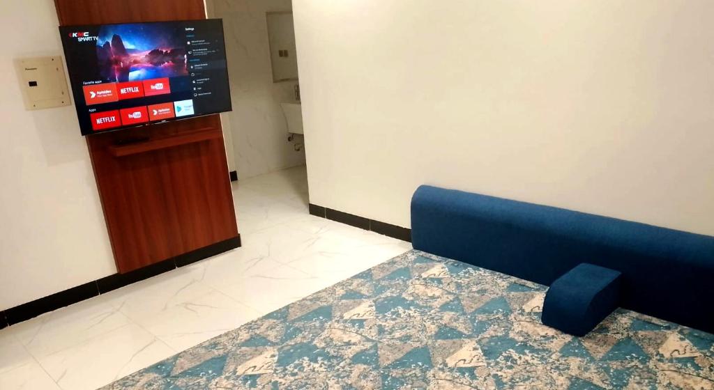 TV a/nebo společenská místnost v ubytování سماء الضيافة للوحدات السكنية المفروشة