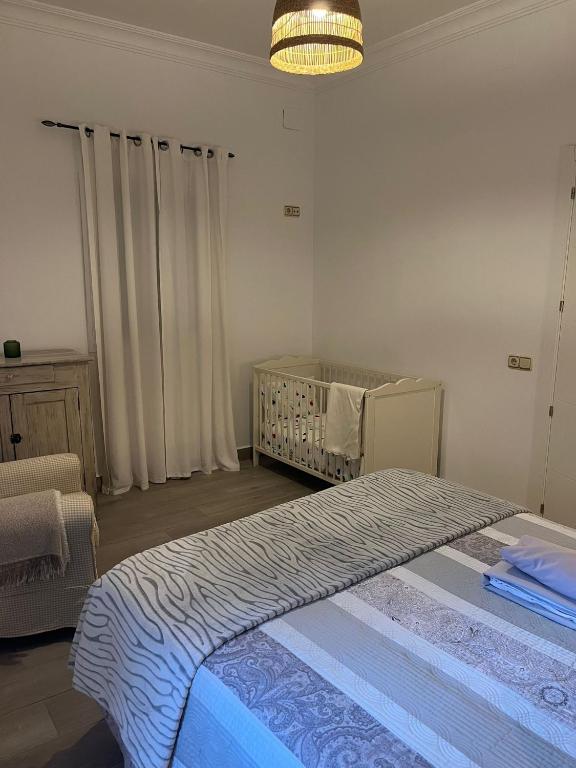 Postel nebo postele na pokoji v ubytování Casa isabel