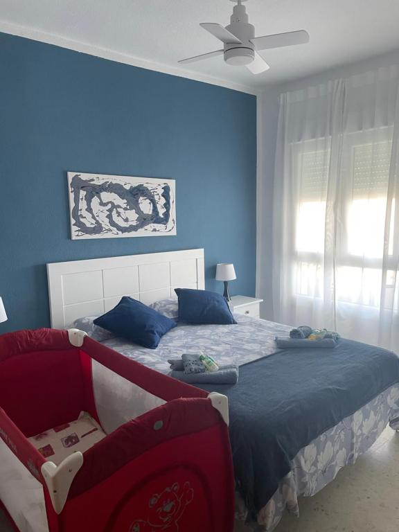 Posteľ alebo postele v izbe v ubytovaní Apartamento playa Valdelagrana