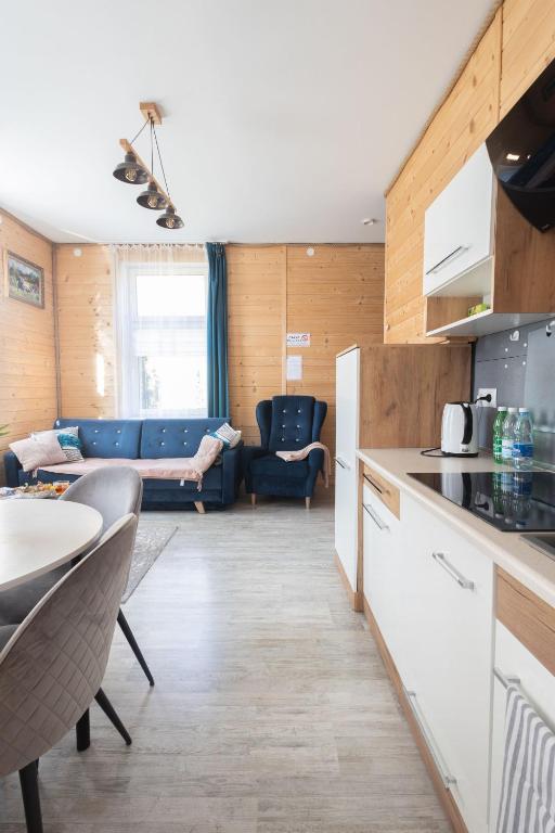 Kuchyňa alebo kuchynka v ubytovaní Apartamenty pod Kicarzem