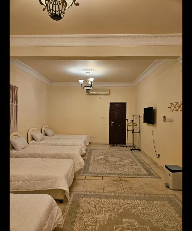 Postel nebo postele na pokoji v ubytování Hostel Erfan