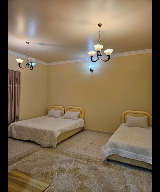 Postel nebo postele na pokoji v ubytování Hostel Erfan