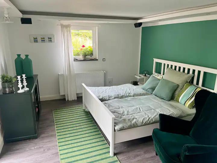 Postel nebo postele na pokoji v ubytování Gästezimmer Seckert Wohlfühlen in der Nähe von MAINZ