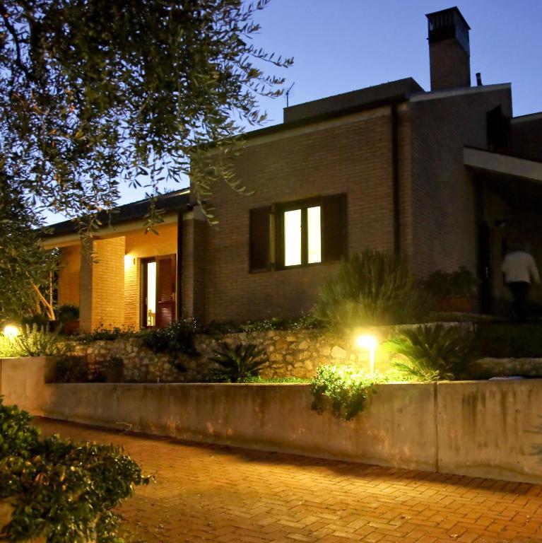 A garden outside Residence Costamartino
