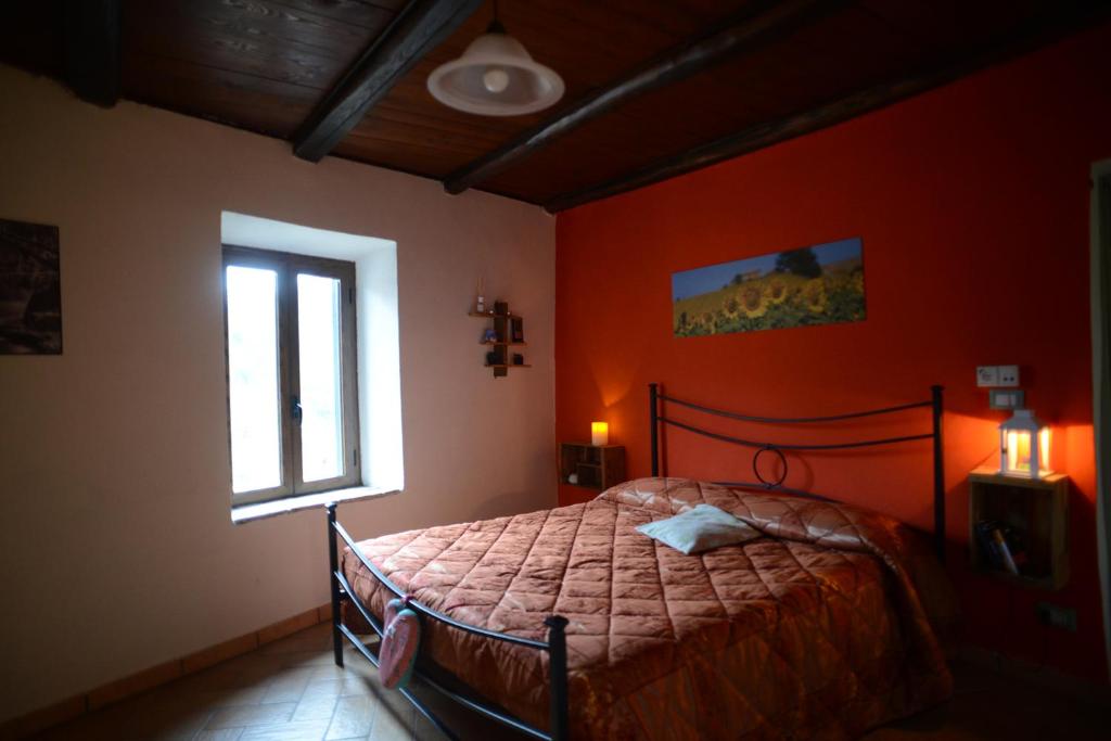 Łóżko lub łóżka w pokoju w obiekcie casa Totò