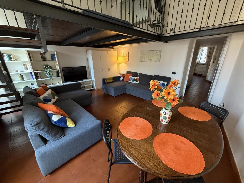 an overhead view of a living room with a table and couch at ROME LUXURY HOUSE - THE SUITE in Rome