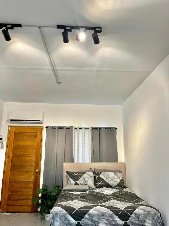 Ένα ή περισσότερα κρεβάτια σε δωμάτιο στο Lee's Transient Unit 4