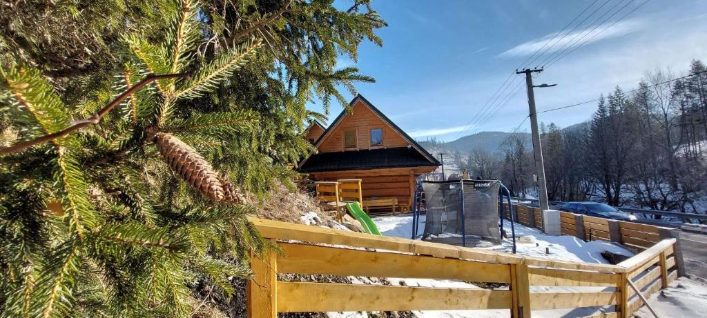 Štýlový Zrub Martina A s kúpacou Kaďou a detským ihriskom! during the winter