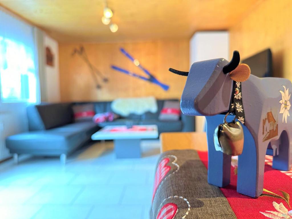 Posezení v ubytování Ski-in, central and cosy in the Chalet Diana, free access to swimming pool