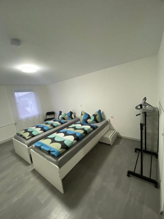 Postel nebo postele na pokoji v ubytování Kovacevic Rooms