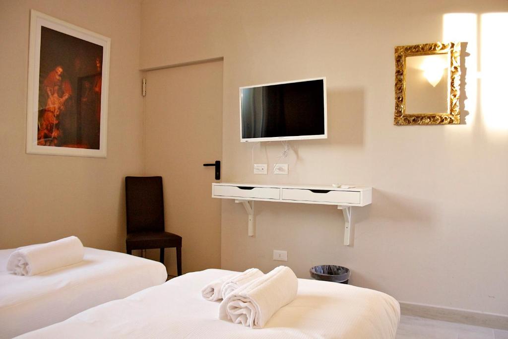 TV a/nebo společenská místnost v ubytování B&B Leonardo