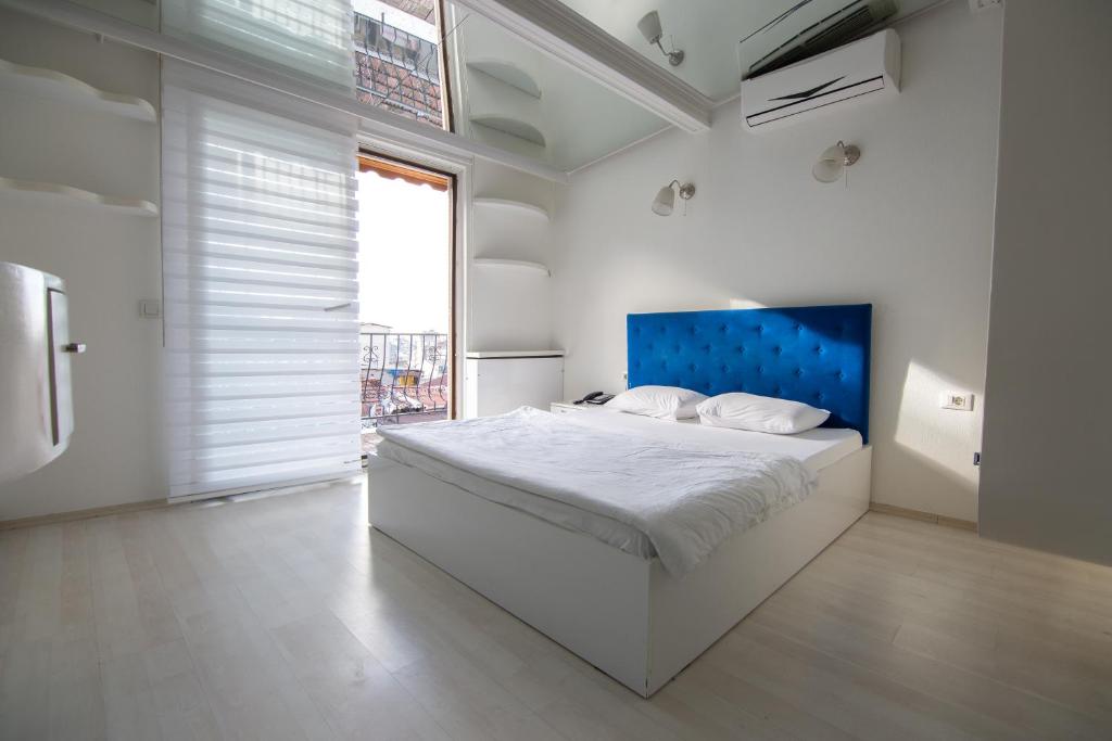 Postel nebo postele na pokoji v ubytování Element Suites