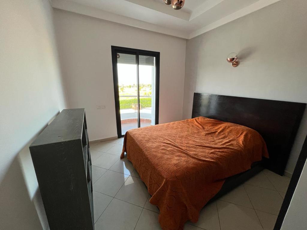 Postel nebo postele na pokoji v ubytování Appartement Cosy Vue sur Mer