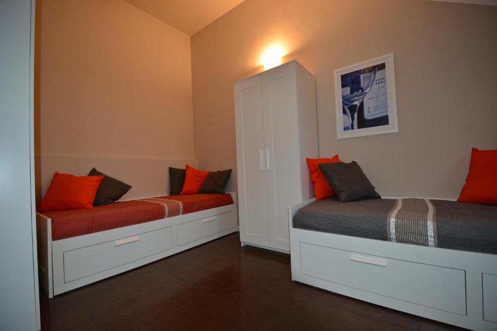 Postel nebo postele na pokoji v ubytování B&B Leonardo