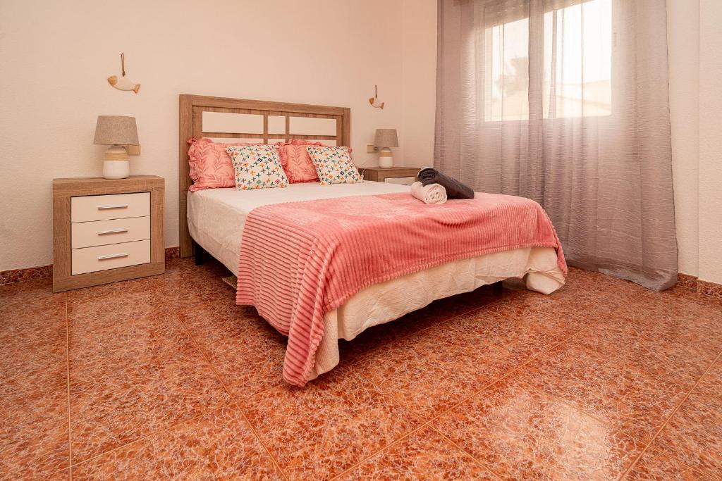 Un pat sau paturi într-o cameră la Casa Mari