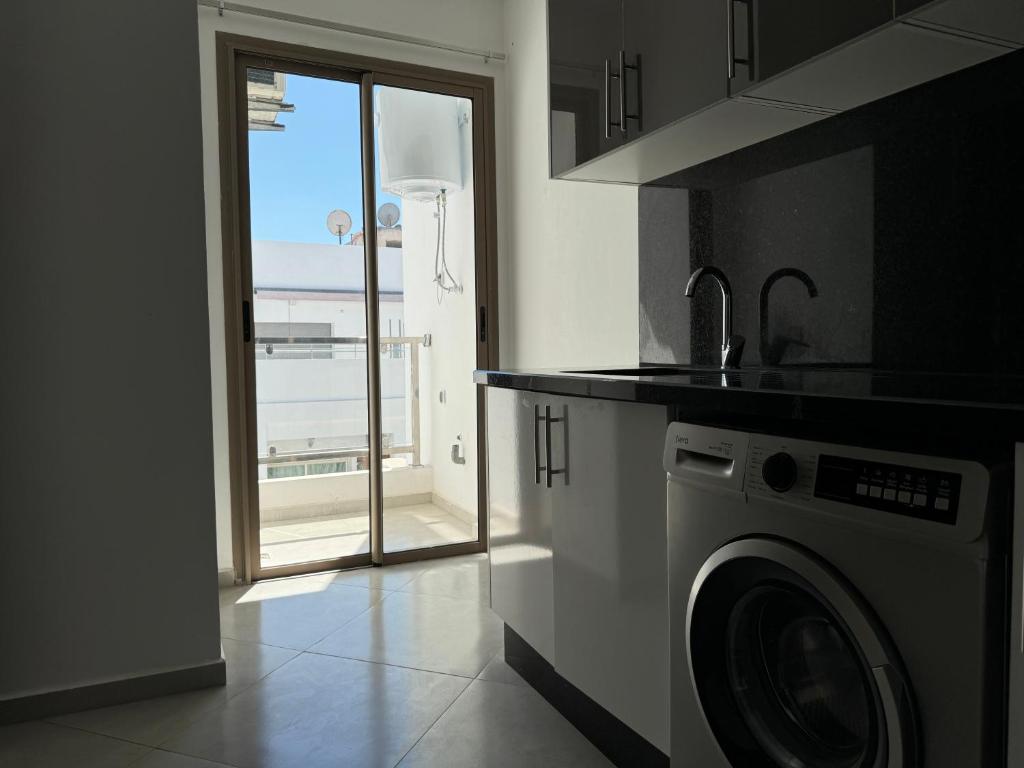 Kuchyň nebo kuchyňský kout v ubytování Nouvel Appartement, Lumineux et Confortable