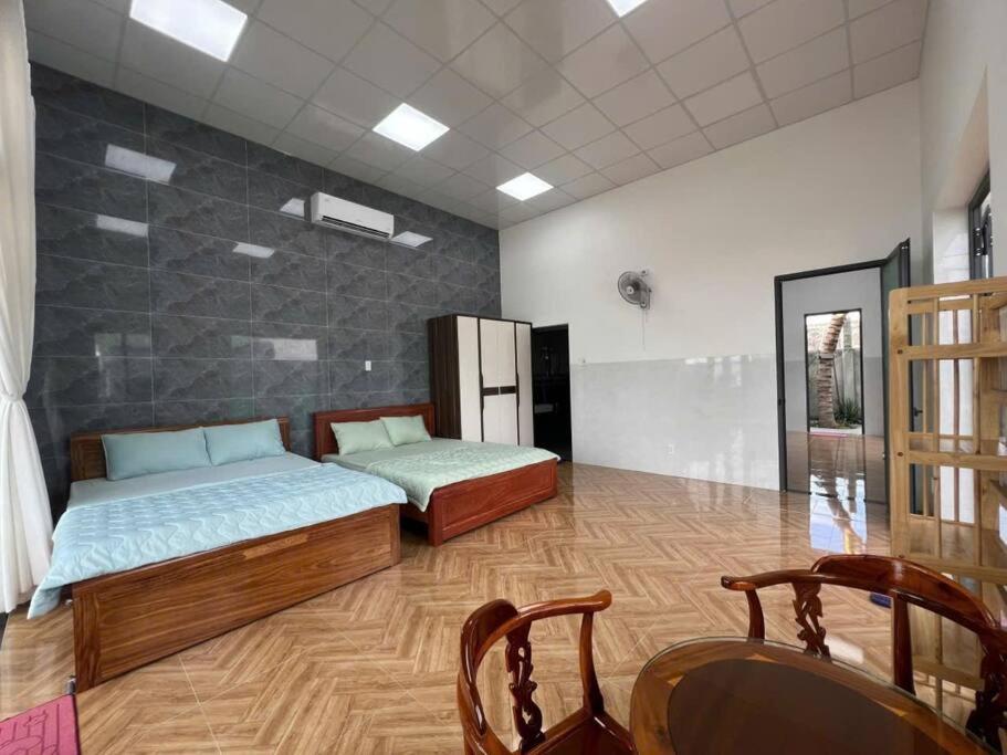 Postel nebo postele na pokoji v ubytování Thái An House