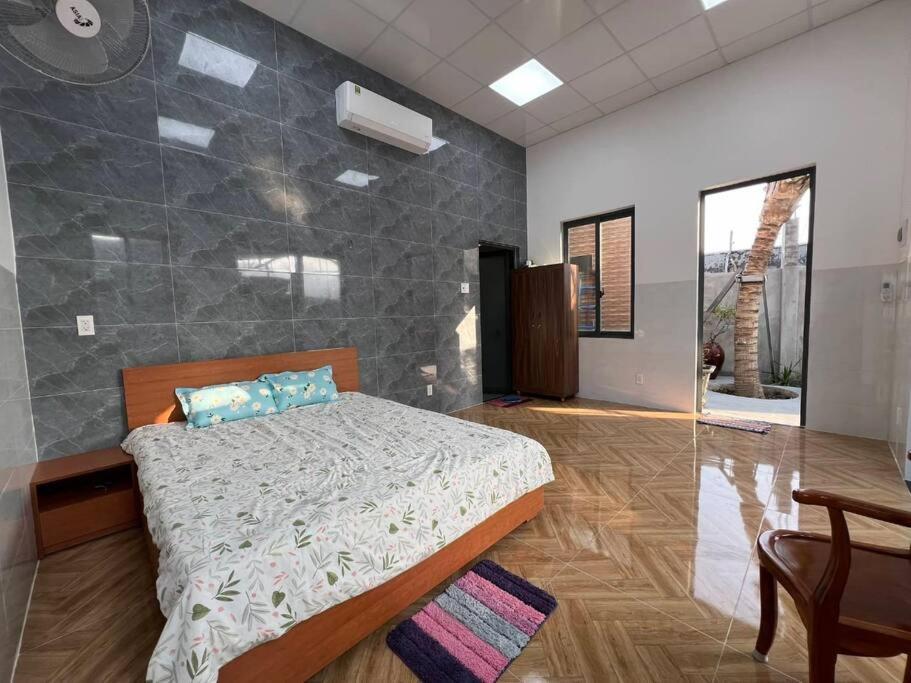 Postel nebo postele na pokoji v ubytování Thái An House