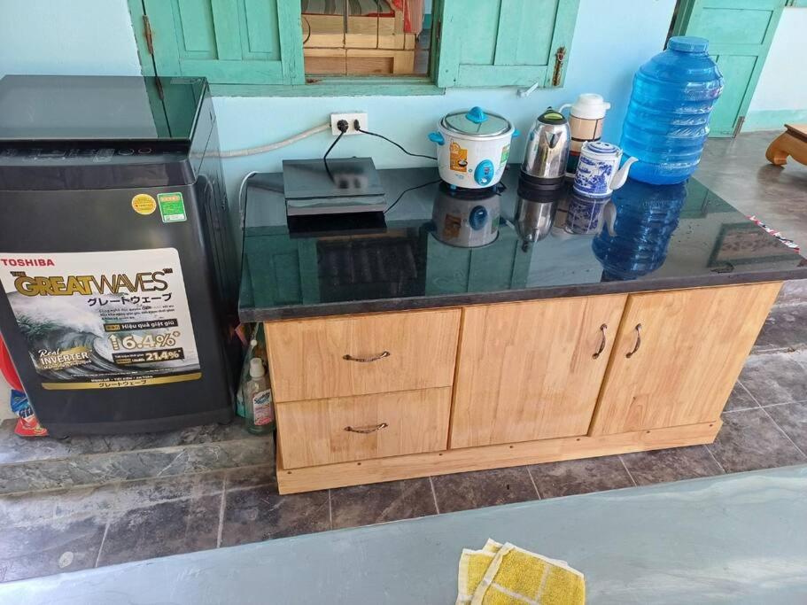 Kuchyň nebo kuchyňský kout v ubytování Thái An House