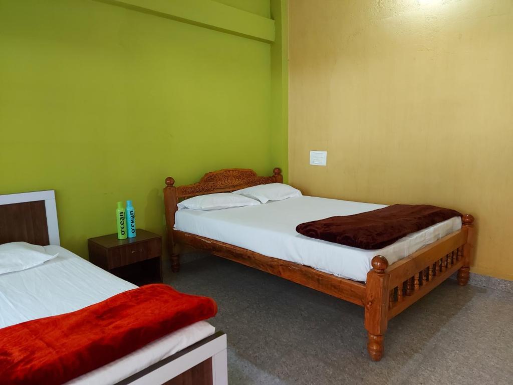 Postel nebo postele na pokoji v ubytování Prestige Nature Homestay Chikmagalur