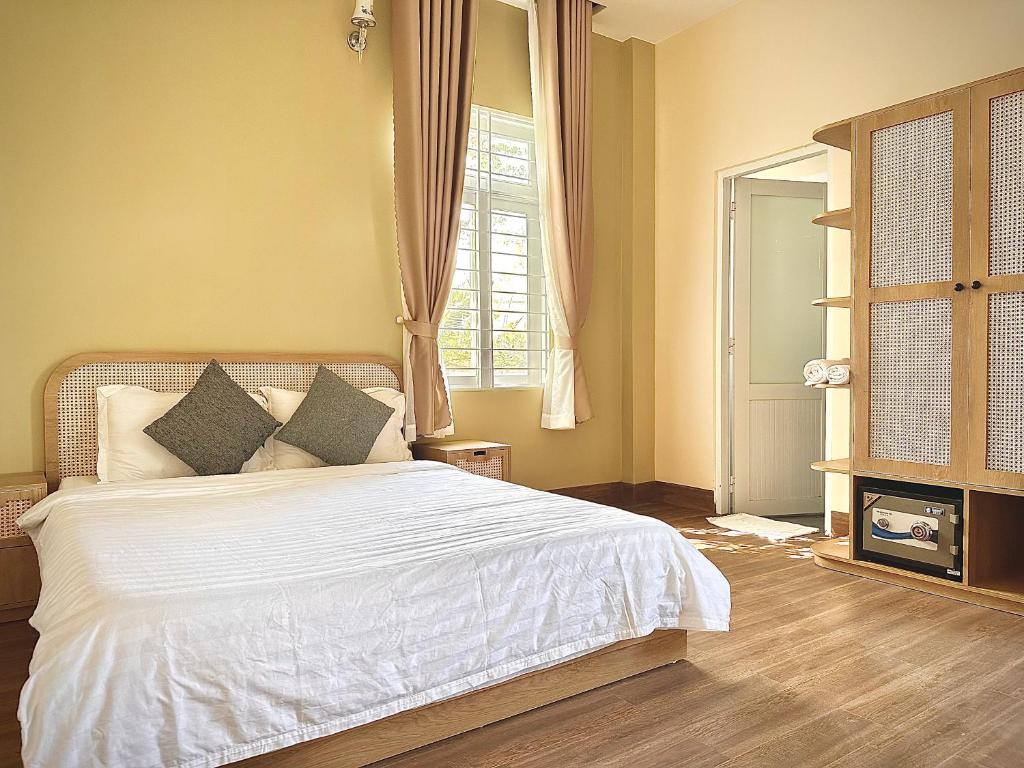 Giường trong phòng chung tại Gia An Hung Guest House