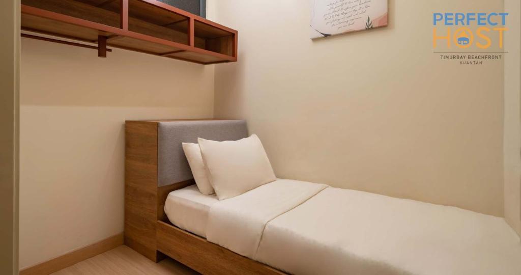 Postel nebo postele na pokoji v ubytování Timurbay Beachfront by Perfect Host