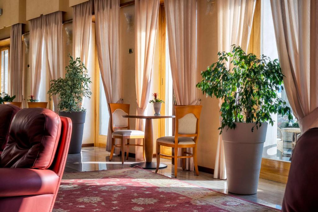 Posezení v ubytování Astura Palace Hotel