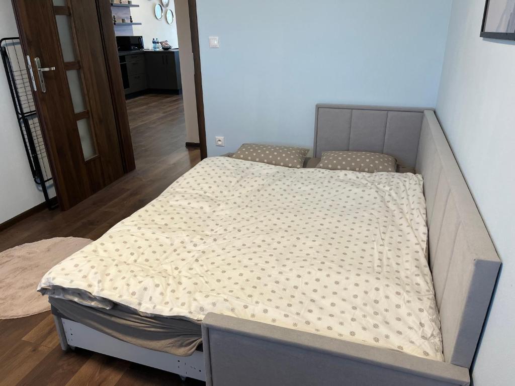Postel nebo postele na pokoji v ubytování Esterhazy Apartman