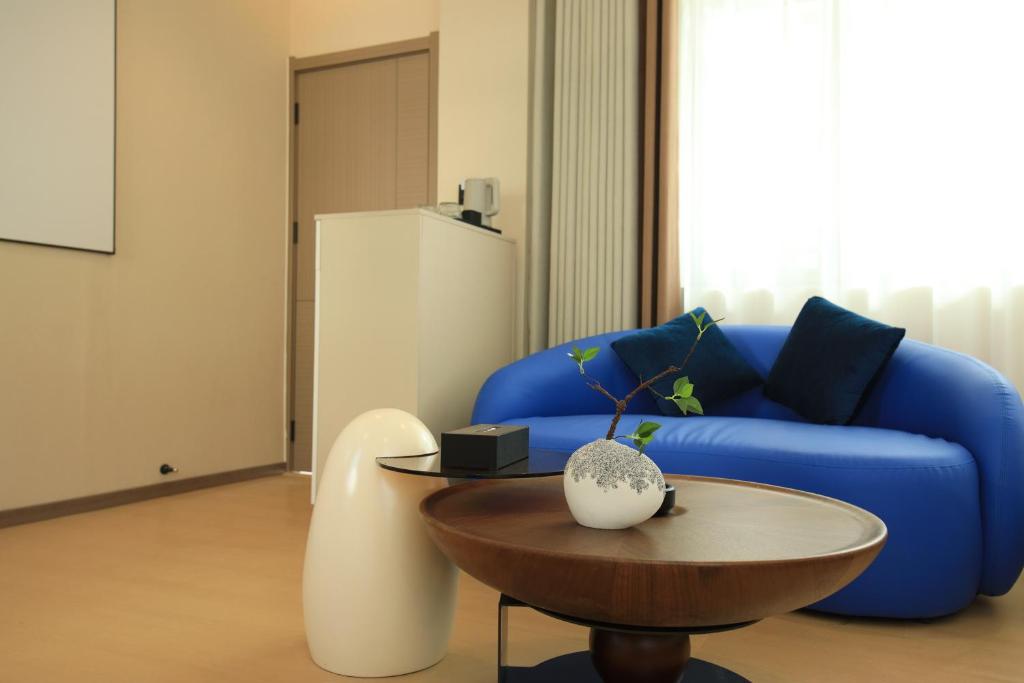 Posezení v ubytování Dali Yufu B&B Hotel