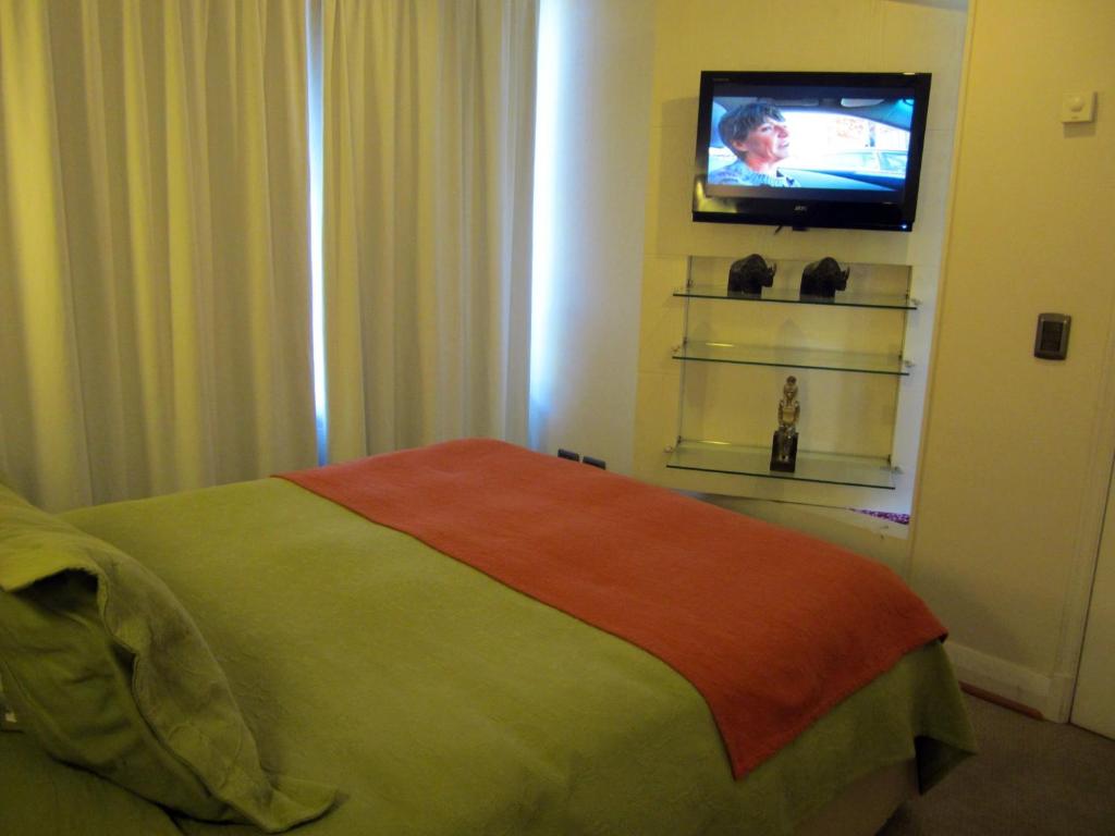 Postel nebo postele na pokoji v ubytování Lobato Apartments