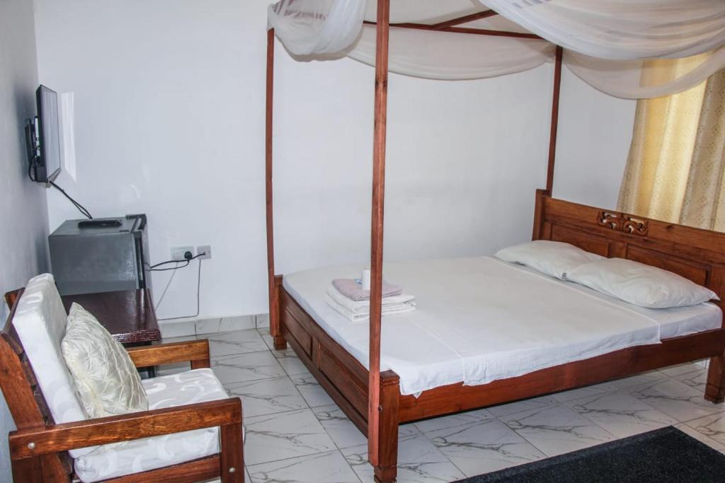 Postel nebo postele na pokoji v ubytování Anna Estate