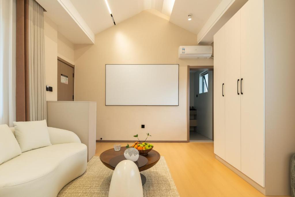 Posezení v ubytování Dali Yufu B&B Hotel