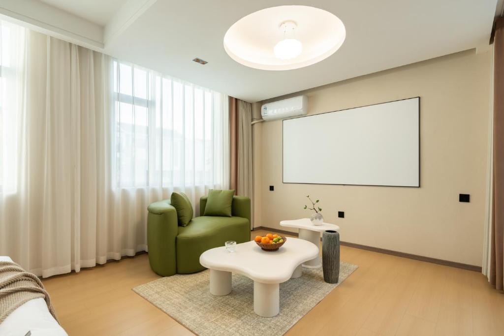 Posezení v ubytování Dali Yufu B&B Hotel