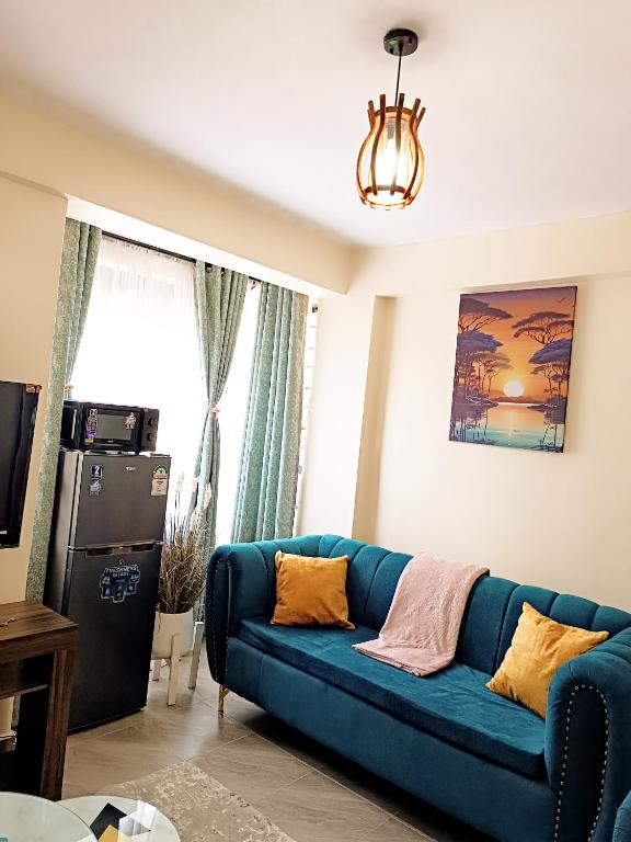 TV a/nebo společenská místnost v ubytování Pacho luxury homes